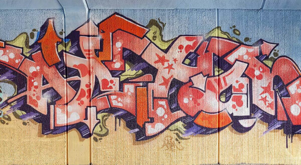 Acton-graffiti on an underpass.